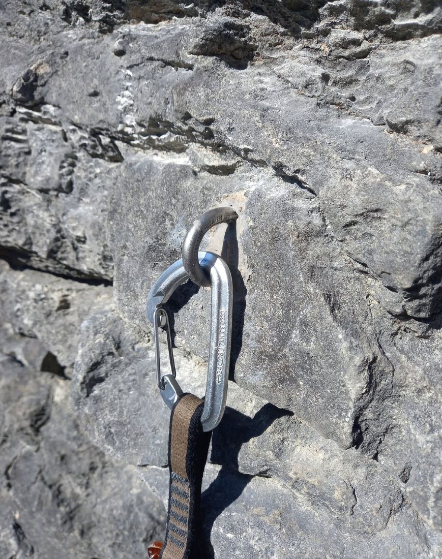 A quickdraw clipped to a new stainless ringbolt